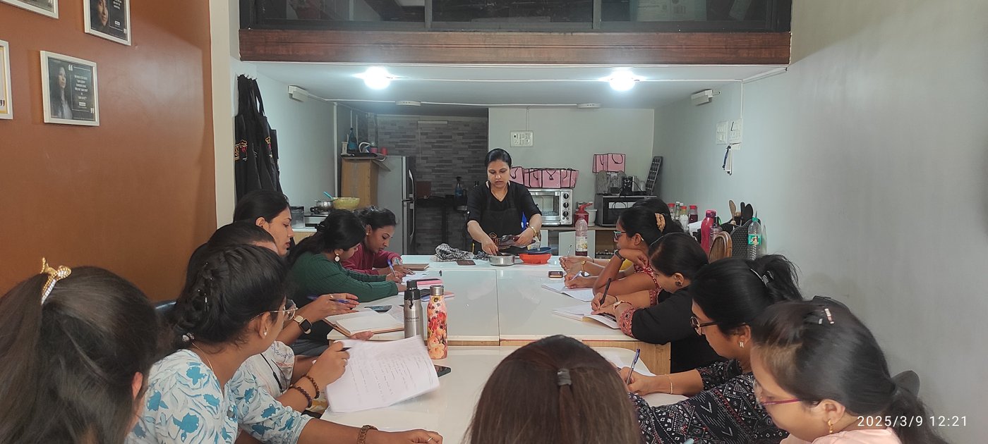 Students practicing cake decoration